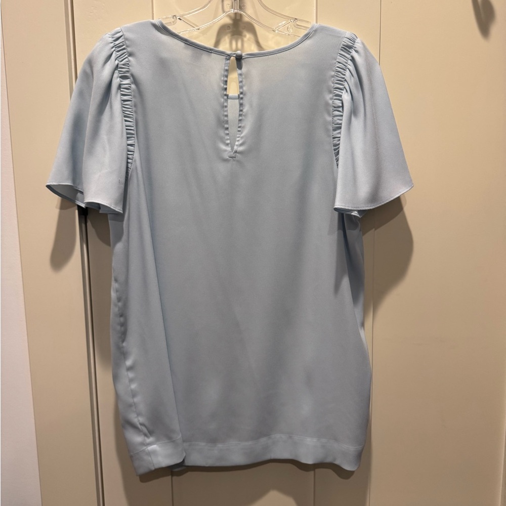 Like new!  Pale blue light top